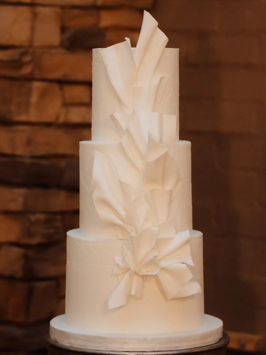 White Sculptural Sails Wedding Cake by VDK Cakes